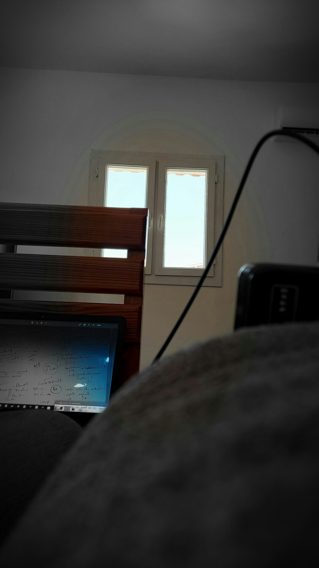 Croatian podcast host recording an episode with a microphone and laptop